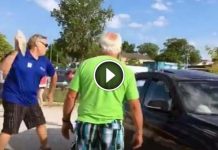This Man Throws A Large Rock At Car’s Window To Free Dog Trapped Inside