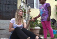 Young Girl Gives Up Her Sandwich To Help Rescuers Save Stray Dog